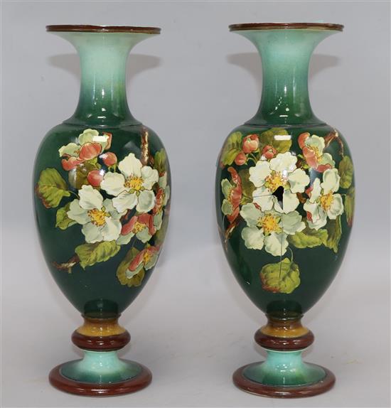 A pair of Doulton Lambeth faience vases height 30cm